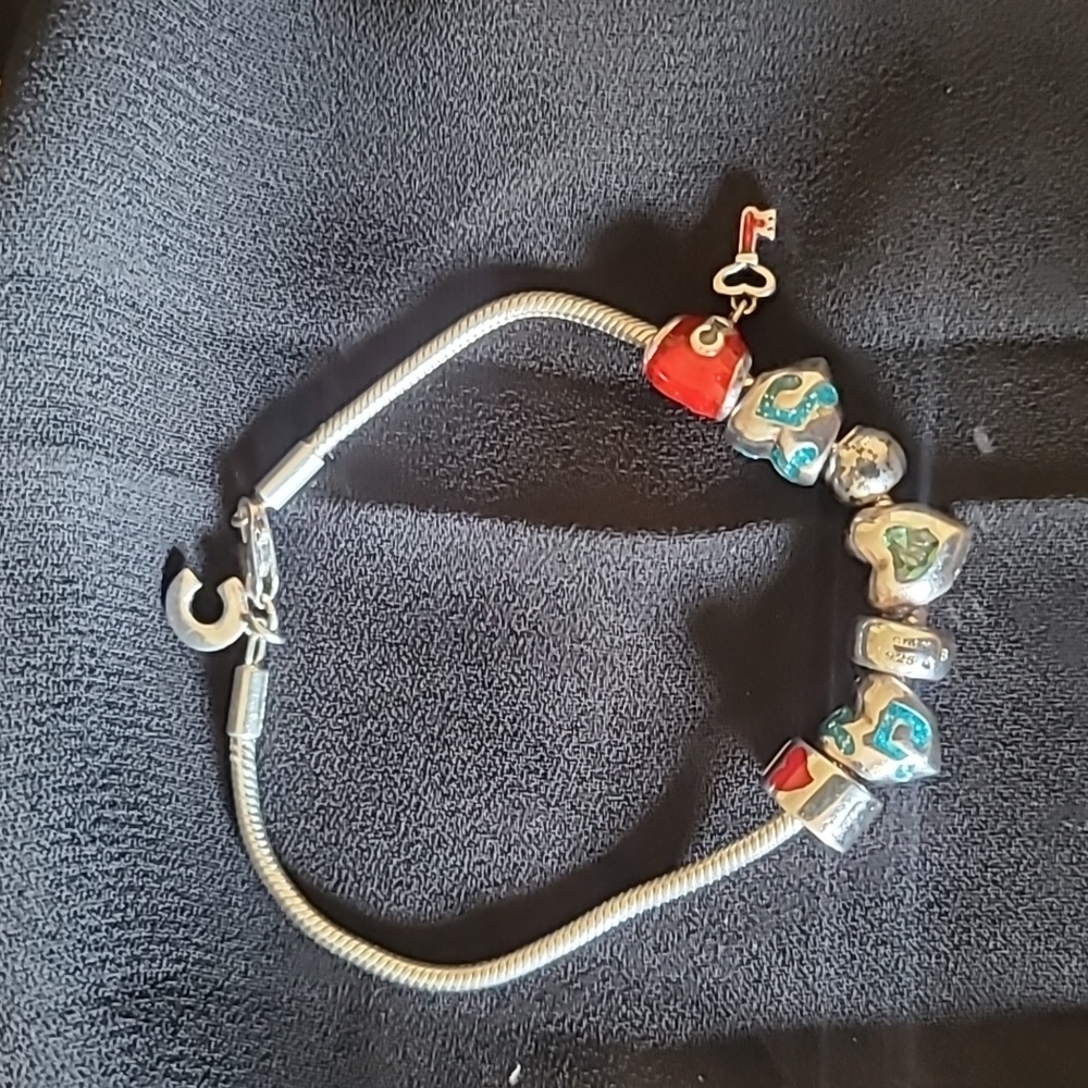 Chamilia Silver Bracelet with Red and Blue Charms